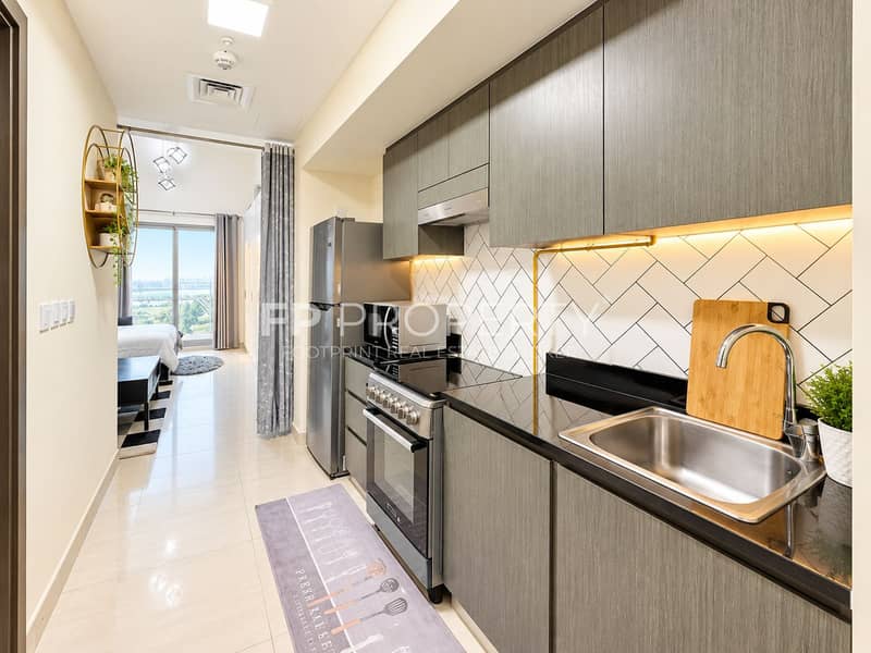 7 Modern Galley Kitchen to Living Space. png