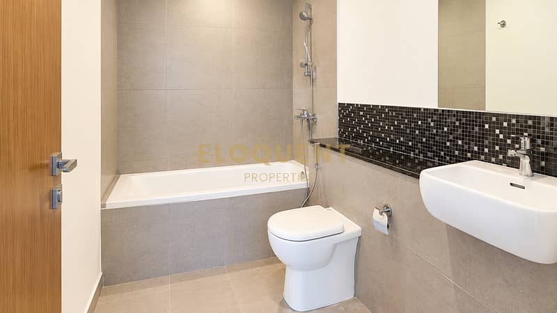 6 Modern Neutral Tiled Bathroom. png