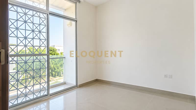 7 Bright Minimalist Room with Geometric Window Grill. png