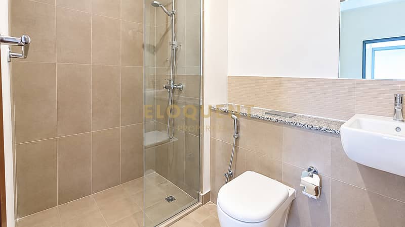 9 Modern Minimalist Beige Bathroom. png
