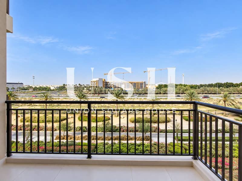 14 Bright Balcony View Over Urban Gardens. png