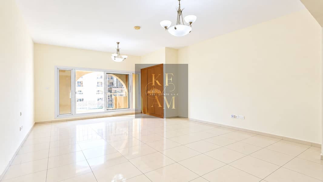 12 Bright Minimalist Room with Chandeliers and Balcony Views. png