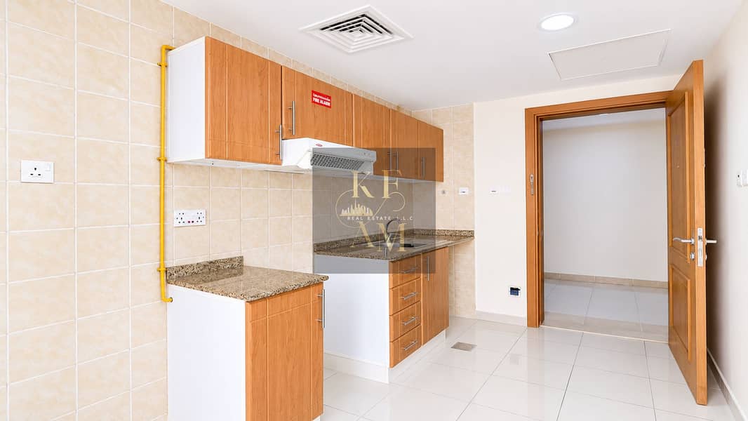 17 Bright Modern Wood-Accented Kitchen. png