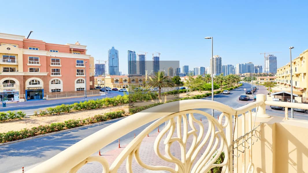 20 Sunny Balcony View of a Gulf City Skyline. png