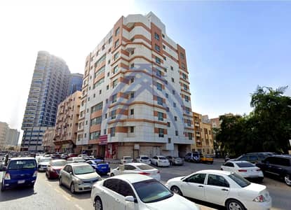 شقة 2 غرفة نوم للايجار في الراشدية، عجمان - building_enhanced_watermarked. jpg