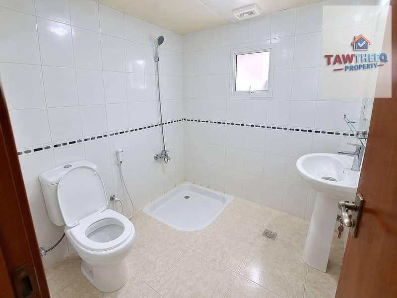 10 Bright Minimalist Tiled Bathroom. png