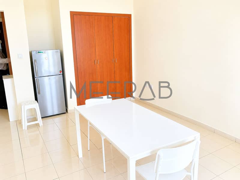 7 Bright Minimal Dining Room with Wooden Wardrobe. png