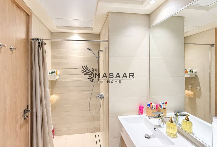 7 Modern Beige Bathroom with Shower and Vanity. png