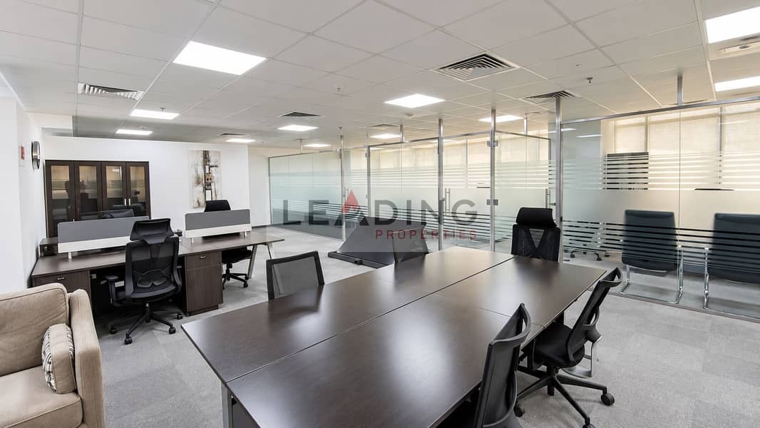 2 Elegant daylight office with glass partitions. png