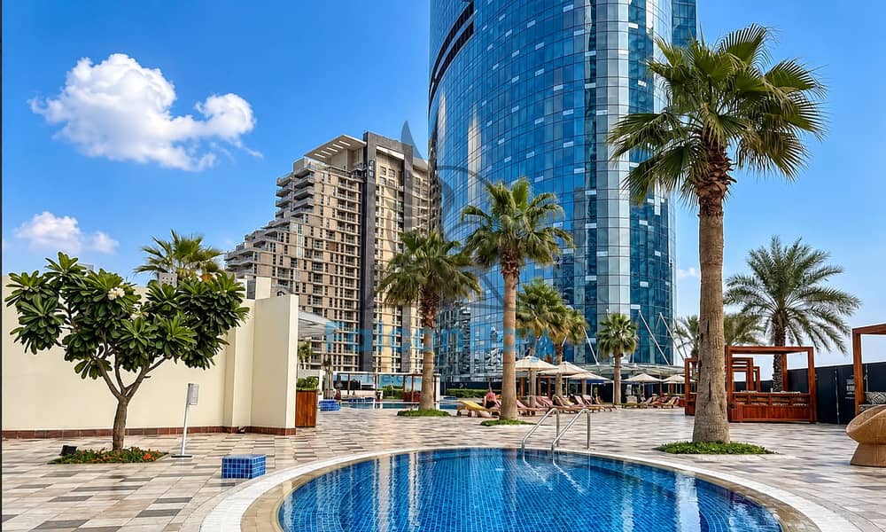 16 Luxury Pool Deck with Glass Towers. png