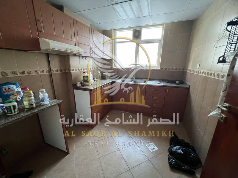 12 غرفة-وصالة-للا-يجار-1-غرف-القليعة-الشارقة-صورة-العقار-vb-001-08. jpg