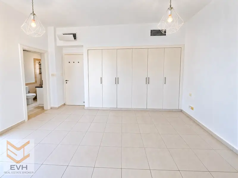 Spacious 2BR + Maid’s Room | Move-In Ready