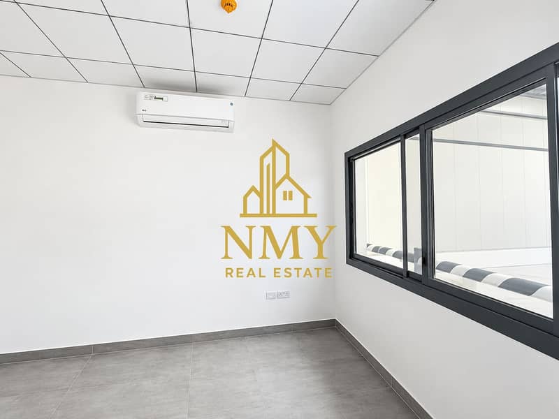12 Minimalist Office Room with Interior Window. png