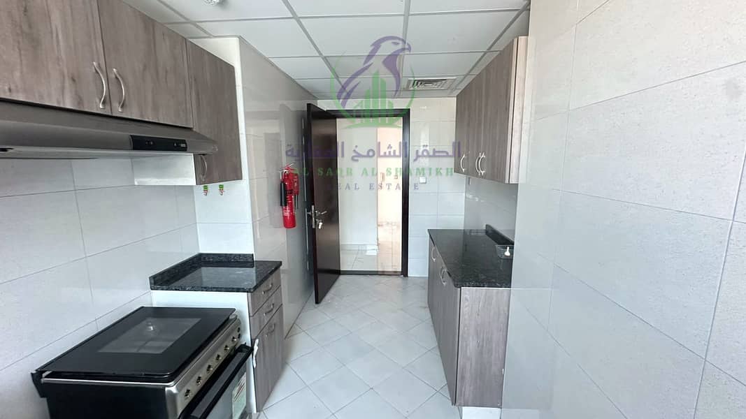 14 apartment-for-rent-2-bedroom-almjaz1-alsharqh-kitchen-12. jpg