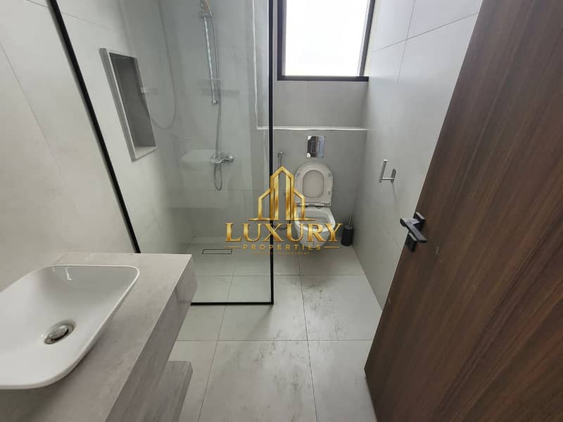 32 Luxury 4-Bedroom Villa for Rent in Hoshi Sharjah