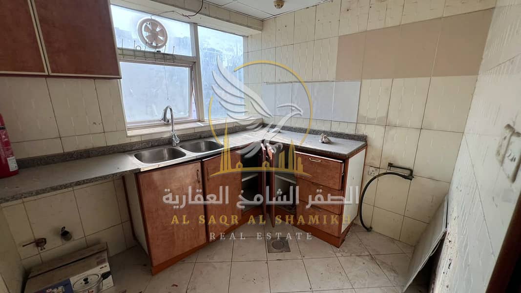 11 غرفة-وصالة-للا-يجار-1-غرف-النباعة-الشارقة-صورة-العقار-re-001-06. jpg