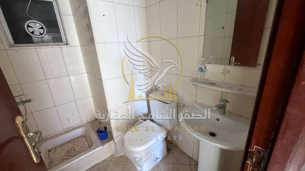 12 غرفة-وصالة-للا-يجار-1-غرف-النباعة-الشارقة-صورة-العقار-re-001-04. jpg