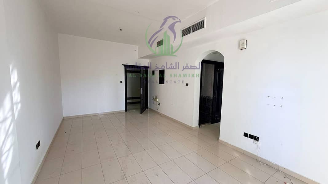 11 apartment-for-rent-1-bedroom-almmzr-alsharqh-living-room-10. jpg