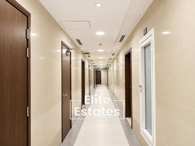 14 Symmetrical Modern Hotel Corridor. png