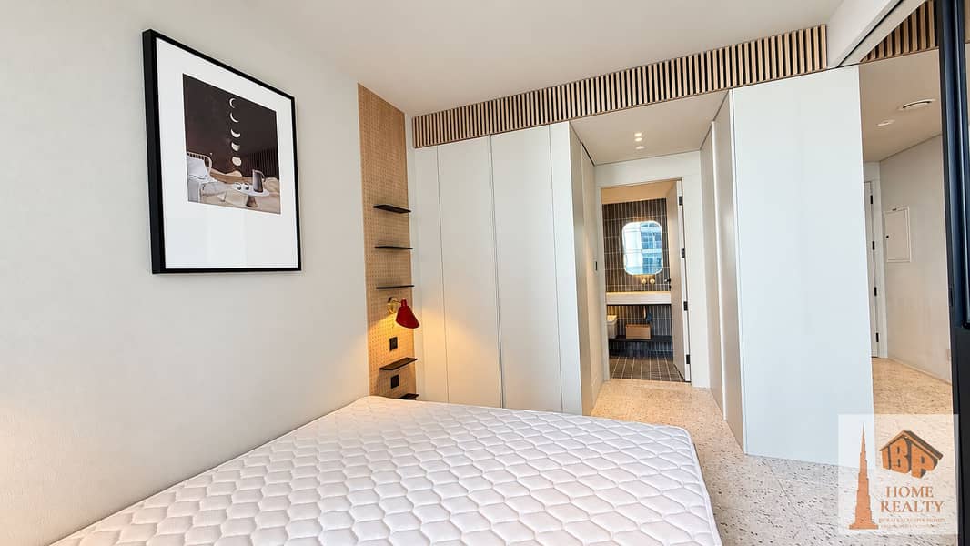 7 Sunlit bedroom with warm wood accents. png