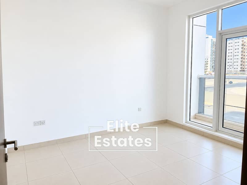 7 Bright Minimalist Room with City View. png