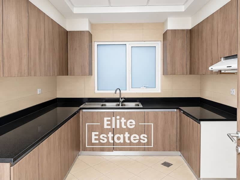 10 Modern Symmetrical Wood and Black Kitchen. png