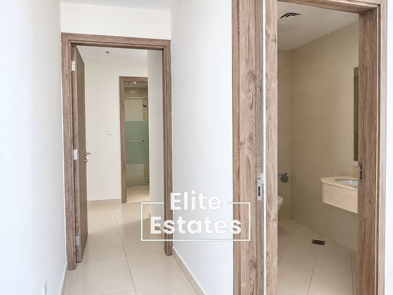 12 Minimalist Hallway with Modern Bathrooms. png