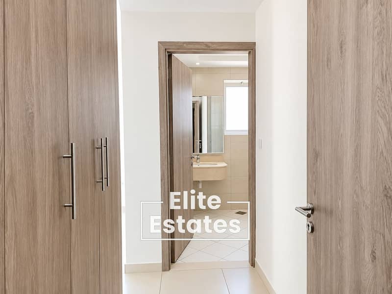 16 Modern Neutral Hallway to Bathroom. png