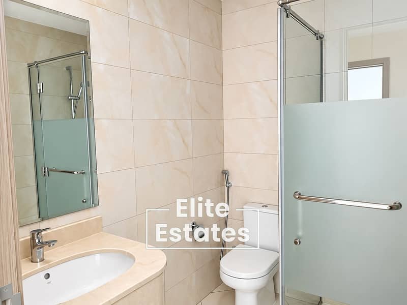 17 Modern Beige Marble Bathroom. png