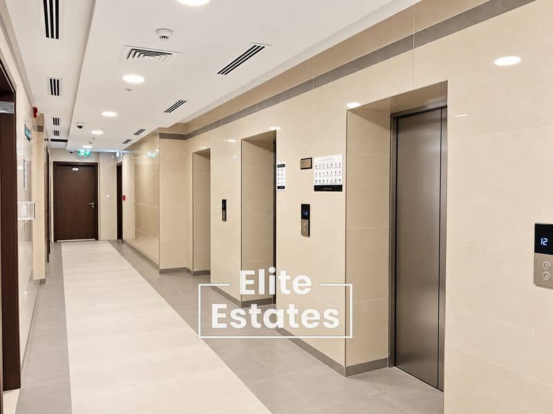 20 Modern Elevator Lobby with Exit Signs. png