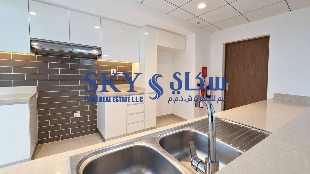 7 Modern Kitchen with Stainless Steel Sink. png