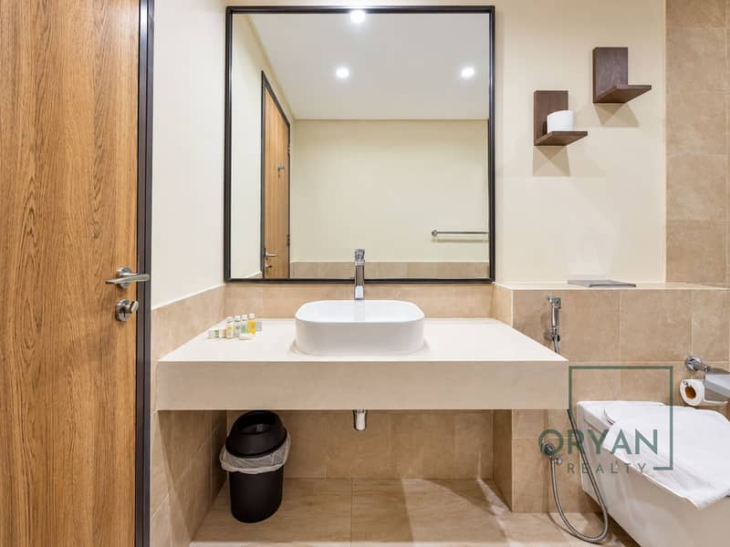 6 Modern Warm-Toned Bathroom. png