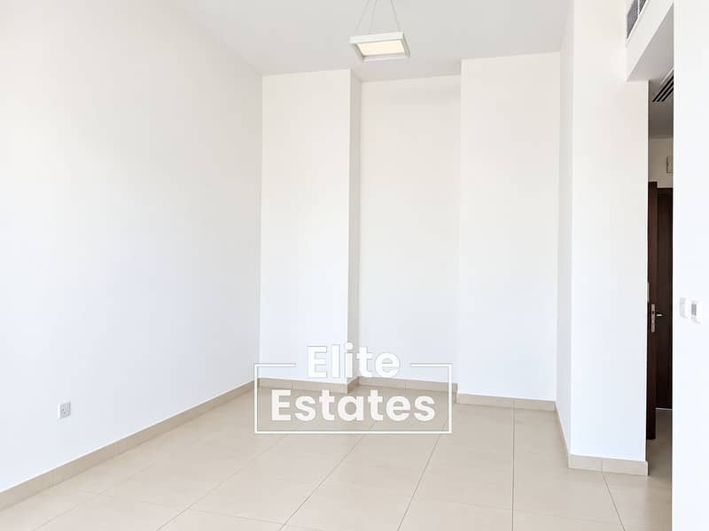 8 Minimalist Tiled Room with Pendant Light. png