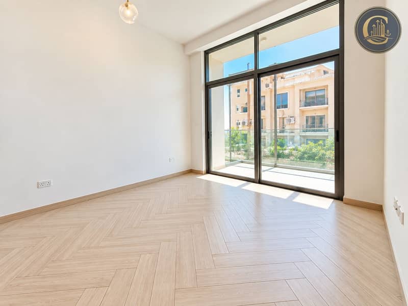 9 Sunlit Minimalist Bedroom with Balcony Views. png