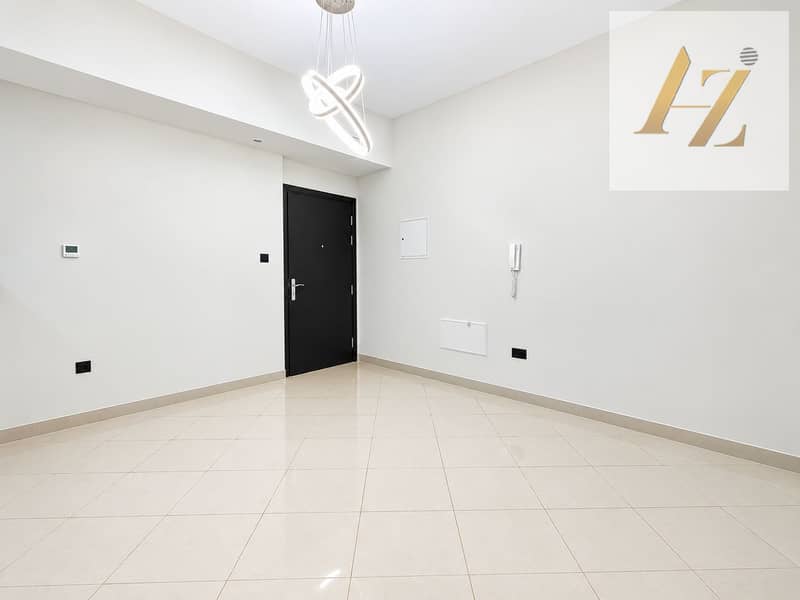 2 Bright Modern Entryway with Sculptural Chandelier. png