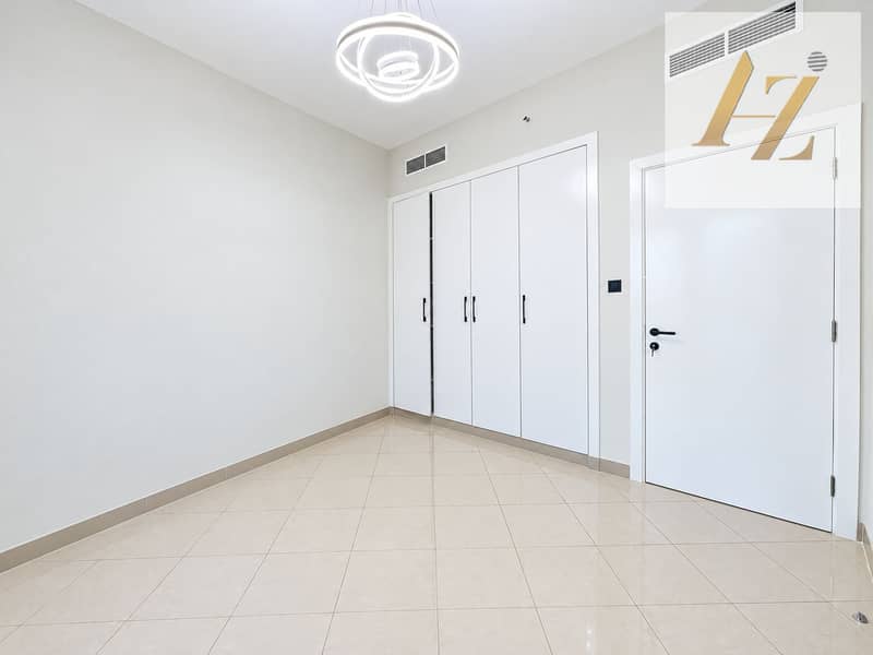 5 Minimal Neutral Room with Ring Chandelier. png