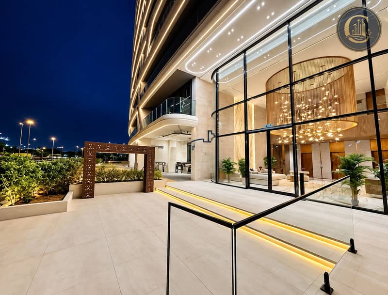 28 Luxury Curved Glass Lobby at Night. png