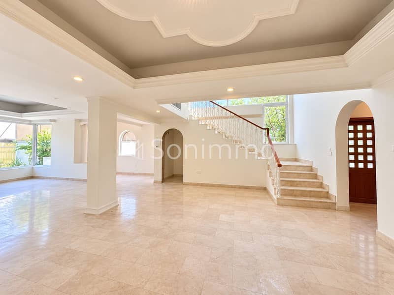 2 Bright Mediterranean Marble Foyer with Grand Staircase. png