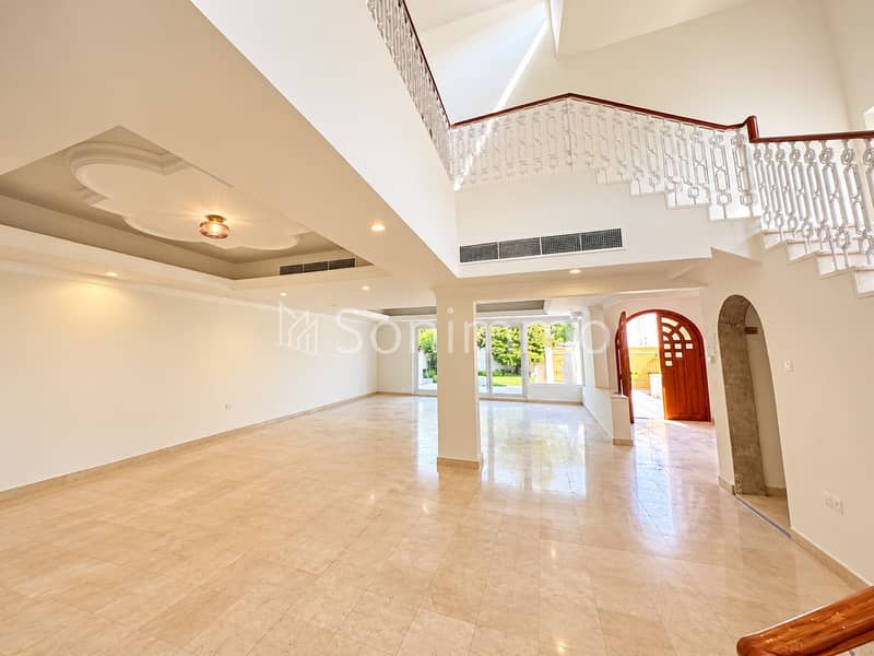 3 Luxurious Double-Height Interior with Garden Views. png