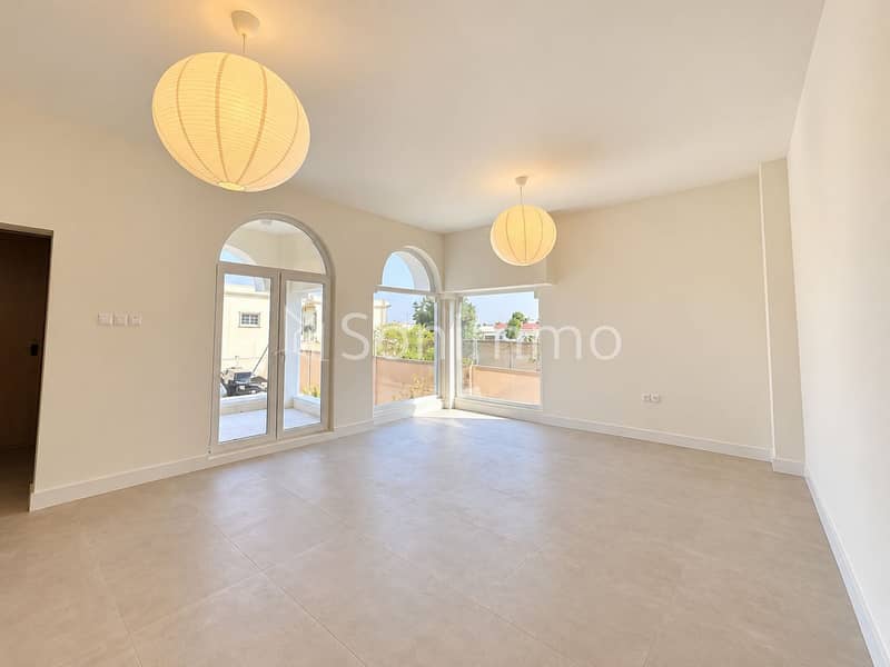 10 Bright Minimalist Room with Arched Windows. png