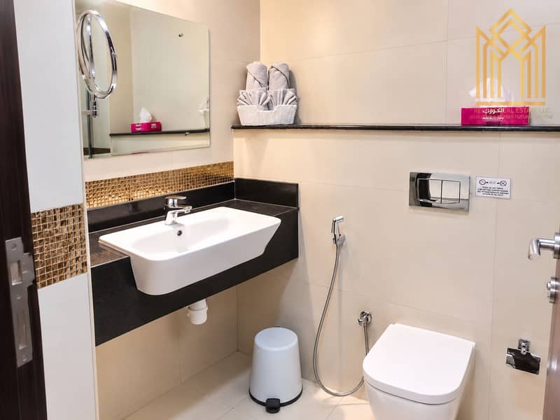5 Bright Modern Beige-Tiled Bathroom. png