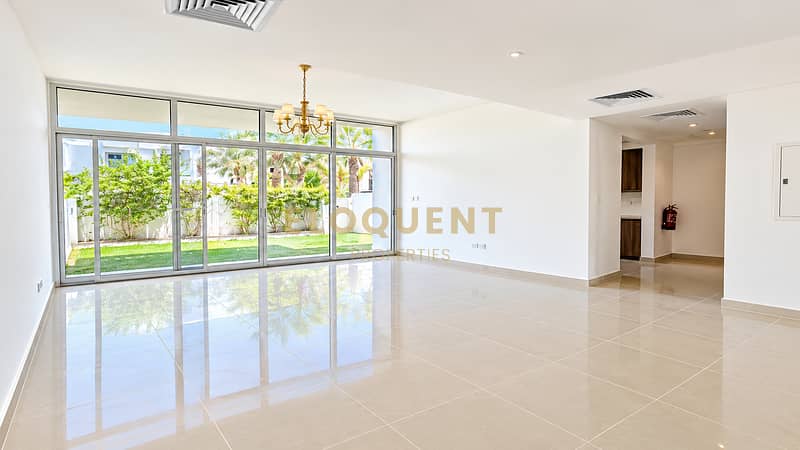 2 Sunlit Modern Living Room with Garden Views. png