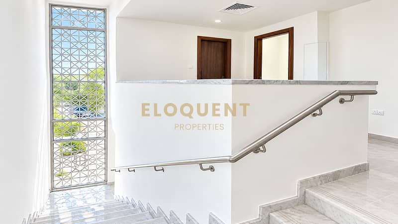 5 Sunlit Modern Marble Stairwell. png