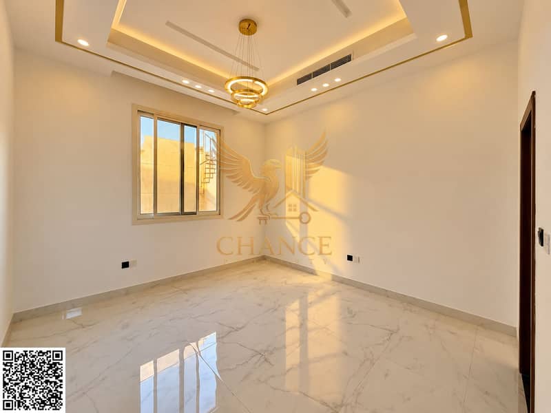8 Golden-Hour Minimalist Room with Brass Chandelier. png
