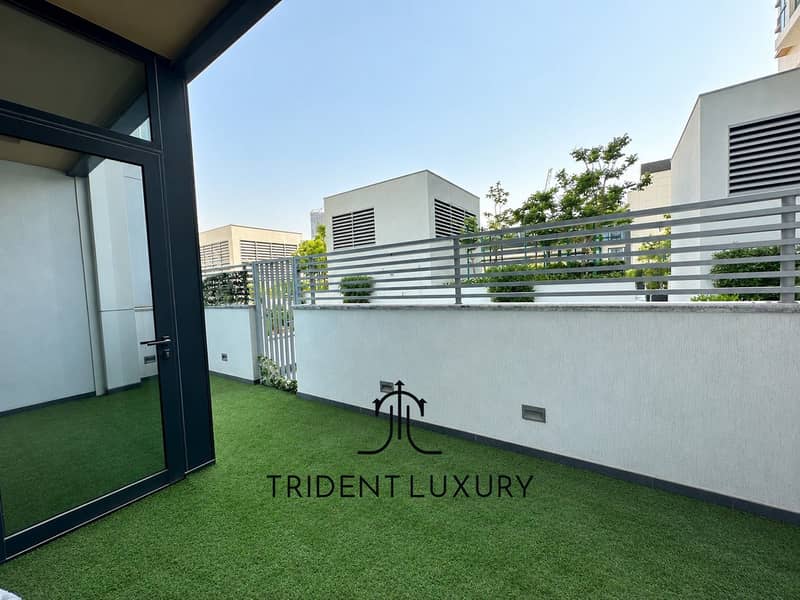 12 Modern Courtyard with Fresh Artificial Grass. jpg