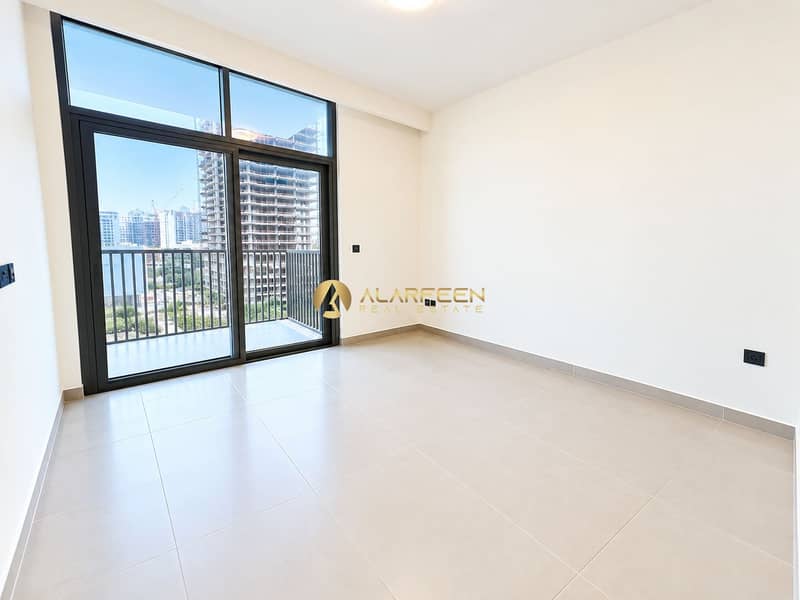 3 Bright Empty Apartment with City Balcony View. png