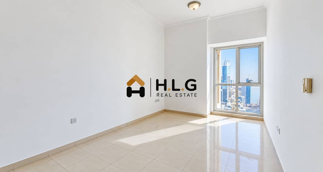 4 Sunlit Empty Room with City Views. png