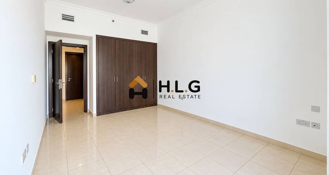 6 Minimalist Bedroom with Walnut Wardrobe. png
