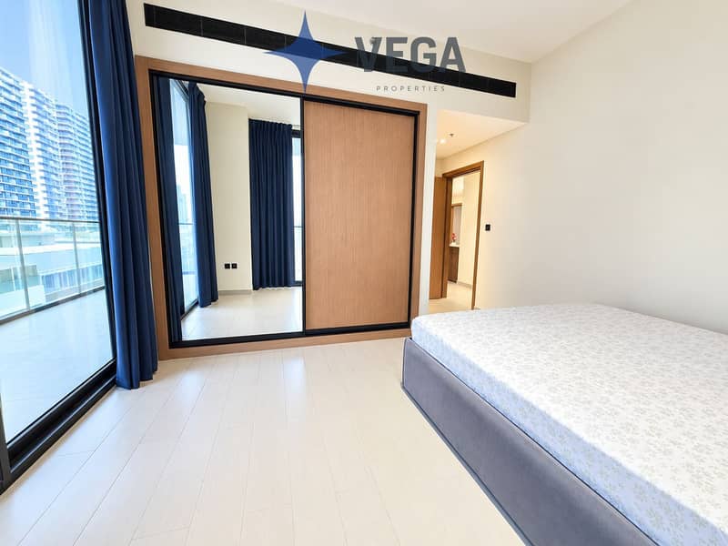 7 Bright Modern Bedroom with Mirrored Wardrobe. png