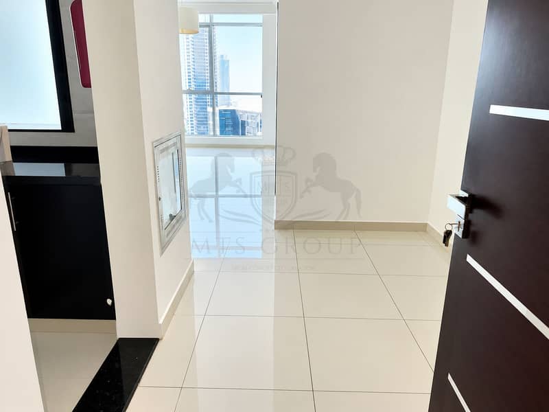 2 Modern Apartment Entryway with City Views. png